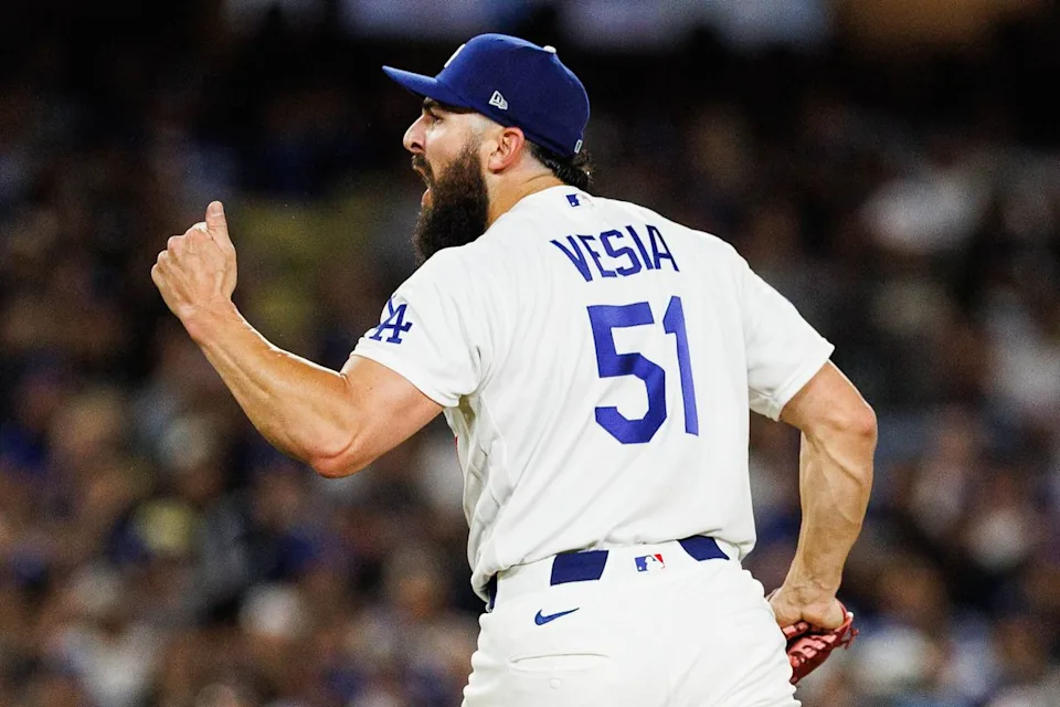 Alex Vesia #51 of the Los Angeles Dodgers celebrates after an inning-ending strikeout during an MLB game against the Texas Rangers at Dodger Stadium on April 10, 2026 in Los Angeles, California.