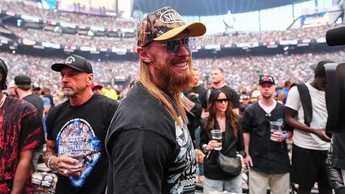 George Kittle standing at Allegiant Stadium during WrestleMania 42 Night 1