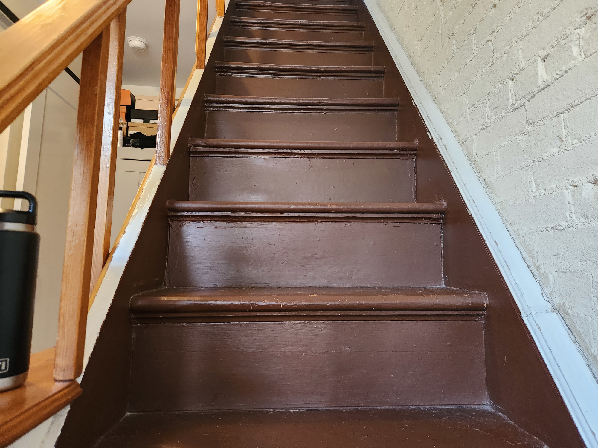 Brown painted stairs in an old home