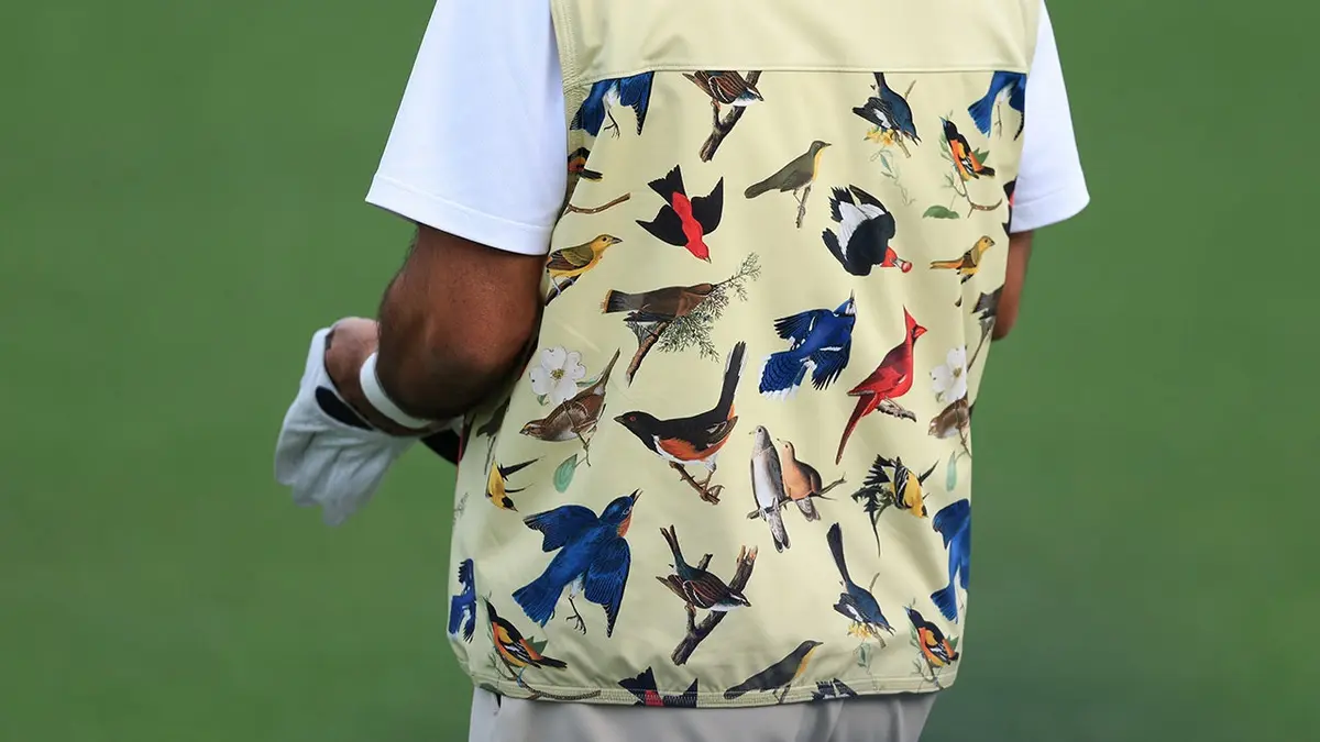 Jason Day wearing a detailed vest during a practice round at Augusta National Golf Club