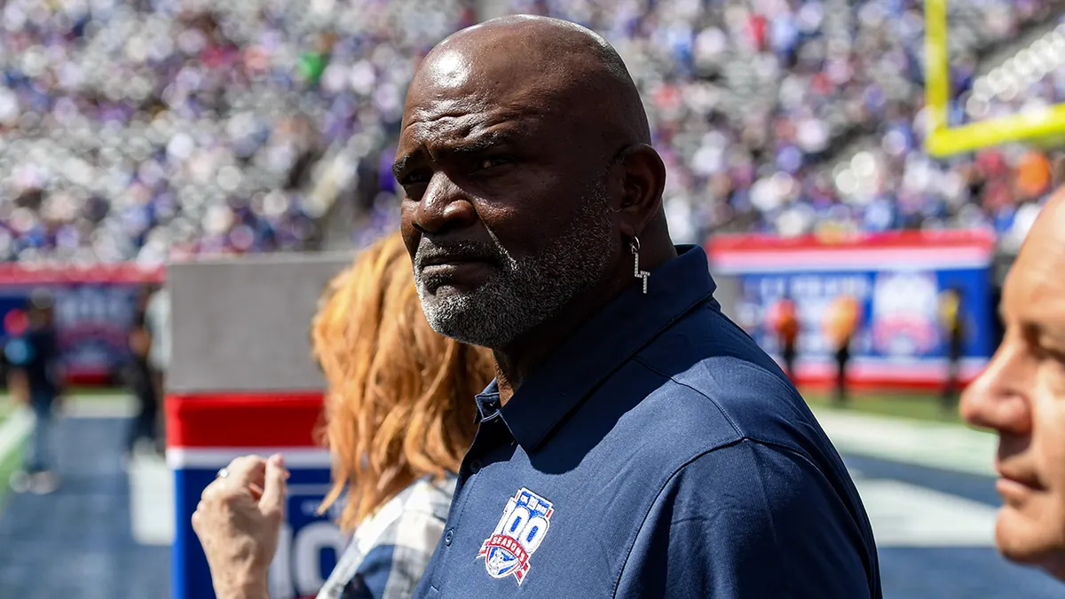 Lawrence Taylor entering the field at MetLife Stadium before a game.
