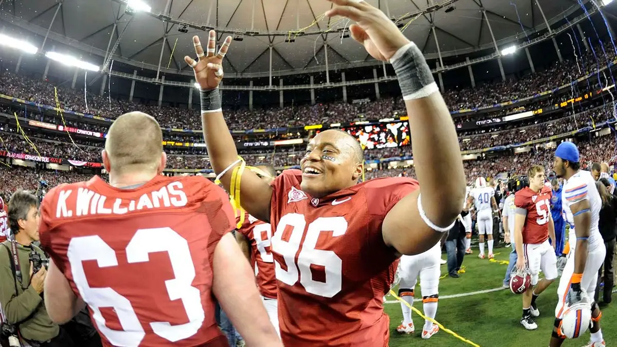 Alabama defensive lineman Luther Davis celebrating on the field