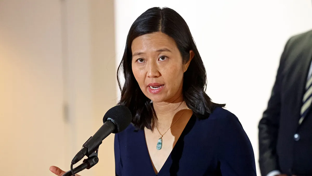 Mayor Michelle Wu speaking at a press conference with city leaders in Boston