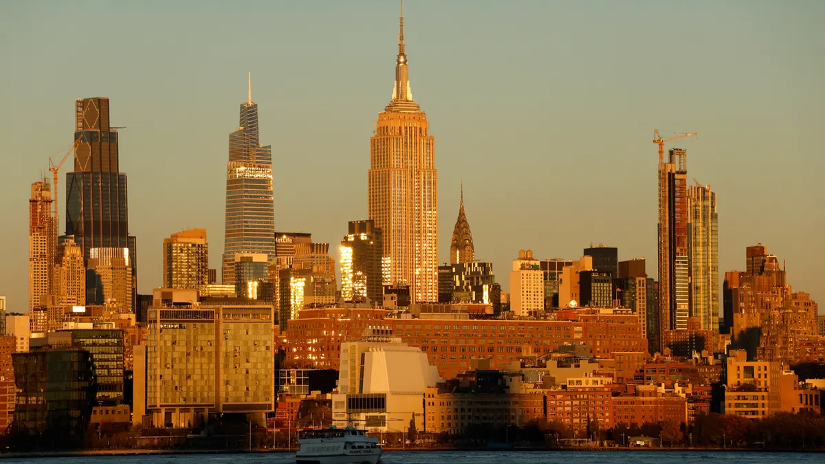 The Empire State Building and midtown Manhattan skyline at sunset in New York City