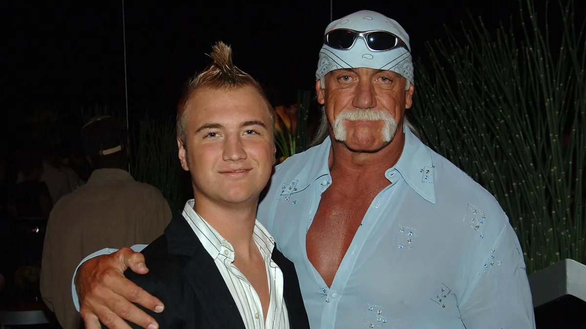 Nick Hogan and Hulk Hogan standing together backstage at Sony Studios in Los Angeles