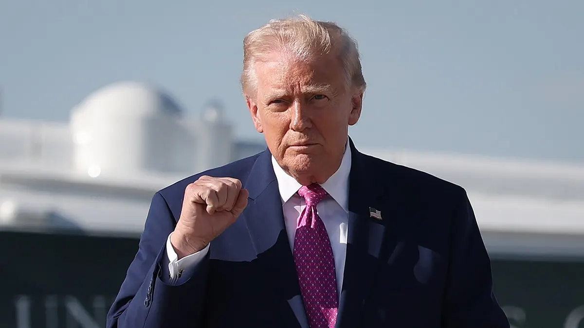 President Donald Trump with fist in air