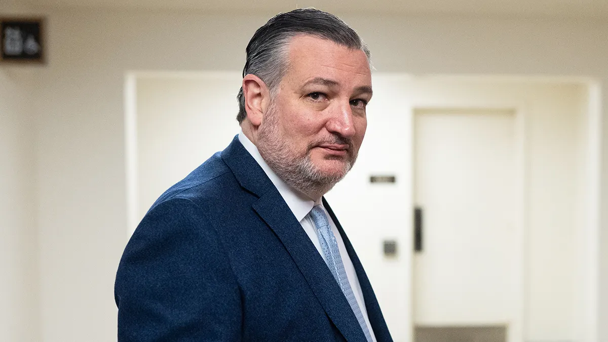 Sen. Ted Cruz walking inside the U.S. Capitol building.