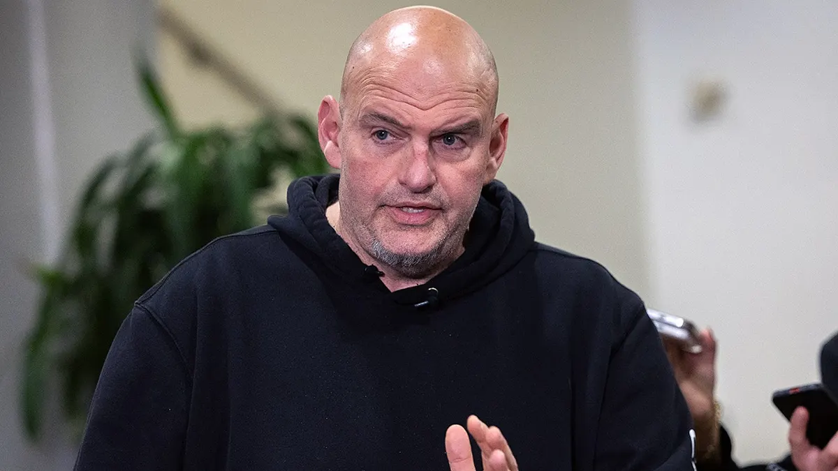 Sen. John Fetterman speaking to reporters