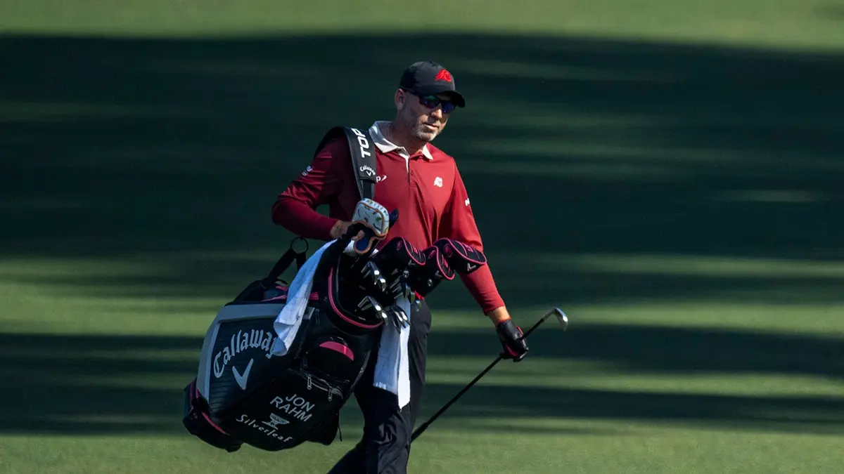 Sergio Garcia carrying his golf bag walking off the fairway at Augusta National Golf Club