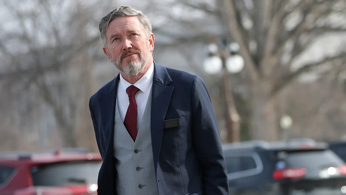 Rep. Thomas Massie walking in a hallway in Washington, D.C.