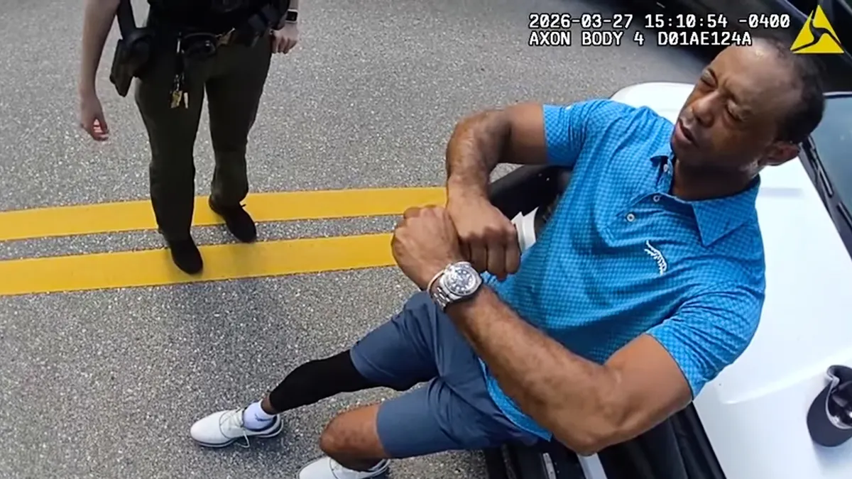 Golfer Tiger Woods performing a field sobriety test on a roadside in Jupiter Island, Florida