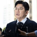 South Korean police seek to arrest K-pop mogul behind BTS