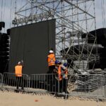 Construction of the stage for Shakira concert in Brazil resumes after worker's death