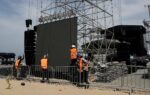 Construction of the stage for Shakira concert in Brazil resumes after worker's death