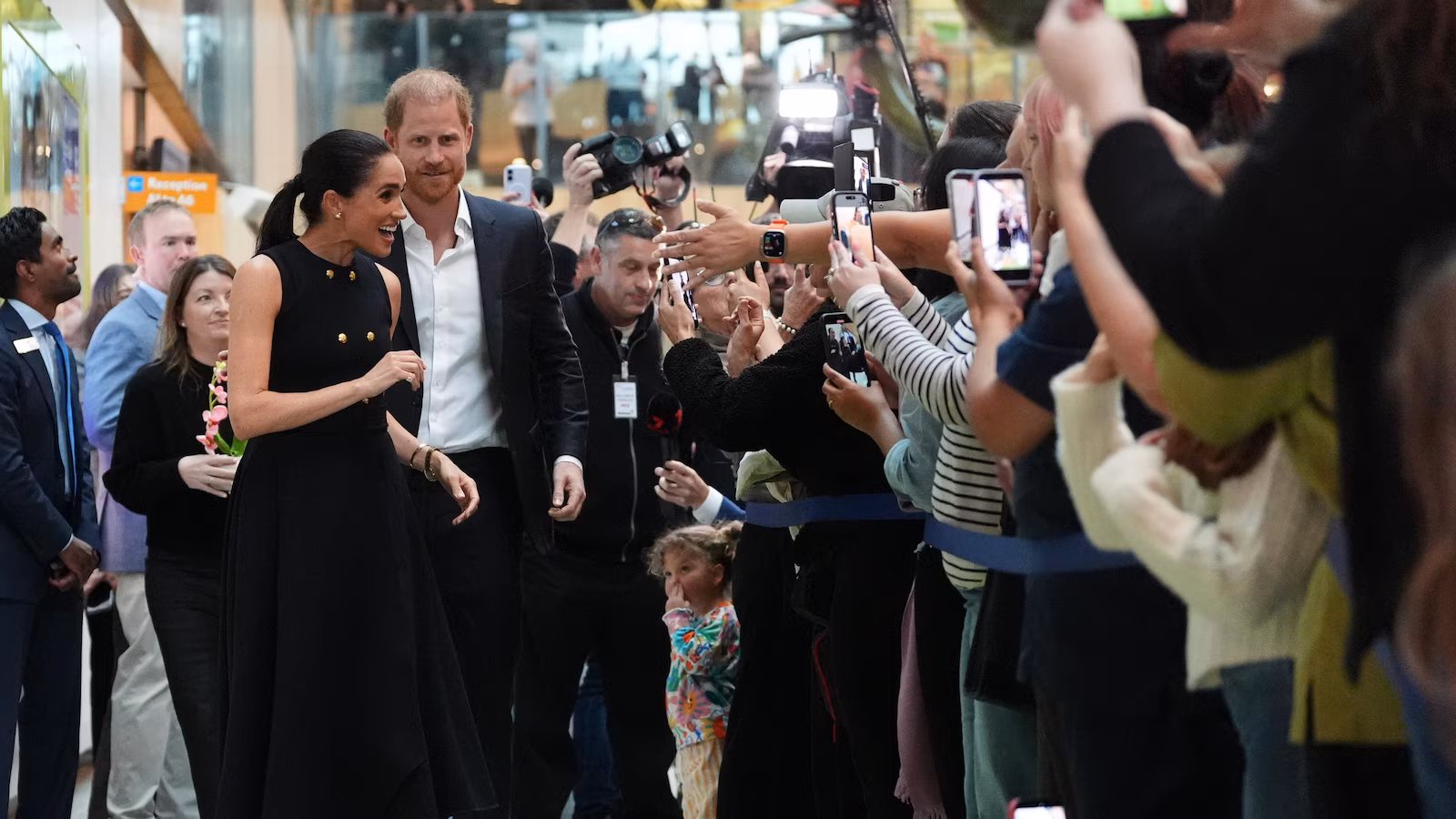 Prince Harry and Meghan arrive in Australia for a low-key, privately funded visit