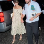 Taylor Swift Proves Every Breezy Floral Dress Needs a Raffia Bag This Summer