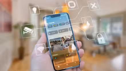 An iPhone showing some smart home scenes with some icons around.