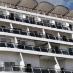 France allows asymptomatic passengers off new cruise ship