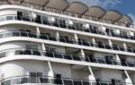 France allows asymptomatic passengers off new cruise ship