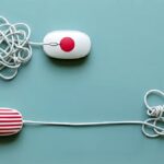 U.S. and Japanese Companies Struggle with Different Parts of AI Adoption—and Offer Different Lessons for Making It Work